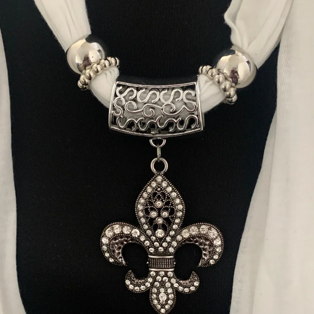 NWOT Chic White Scarf Necklace with Fleur-de-Lis Pendant.